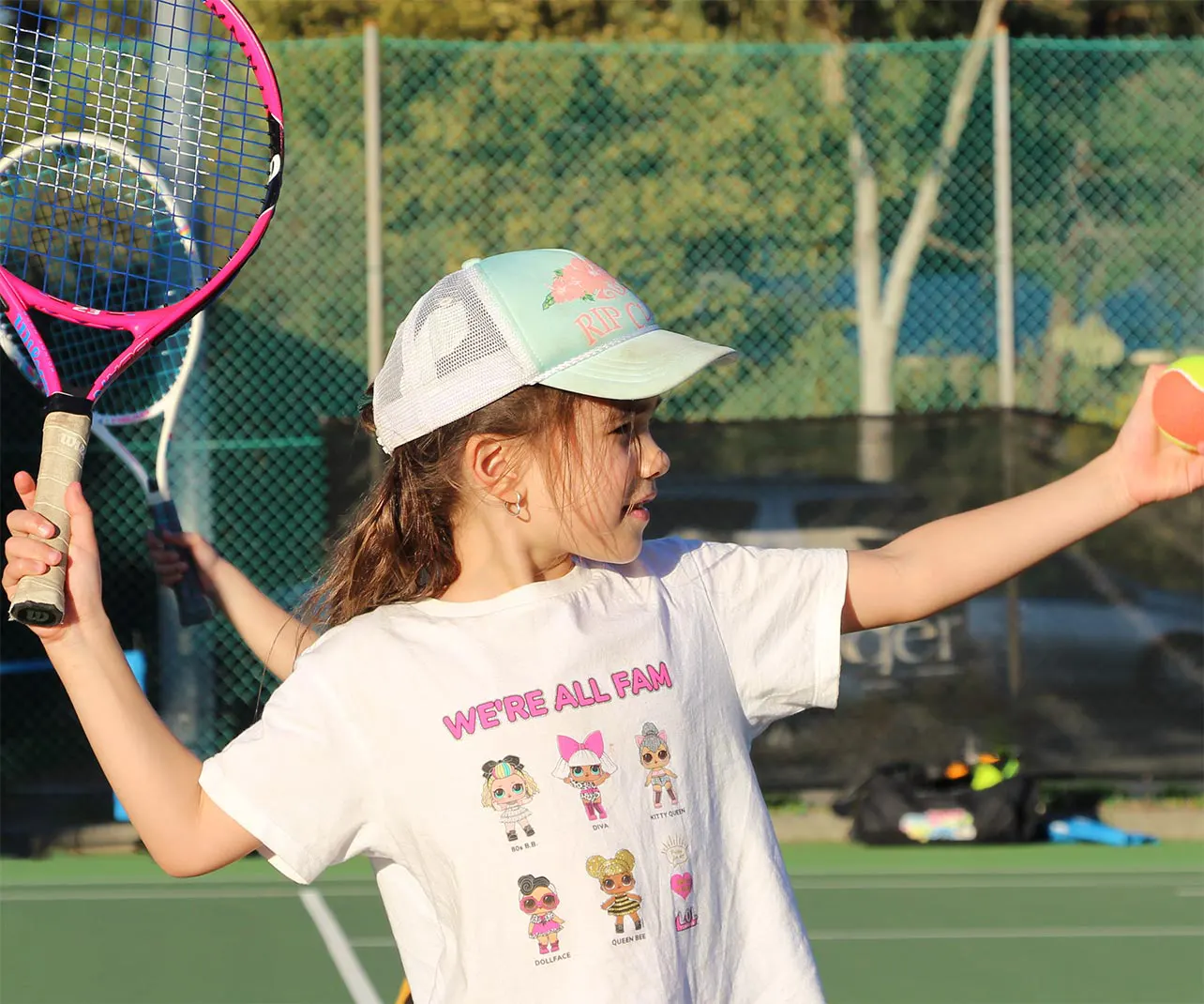 Young tennis player preparing to serve